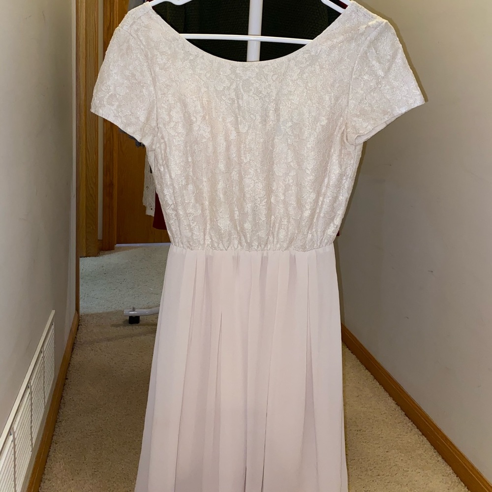 Francesca’s small cream semi formal dress